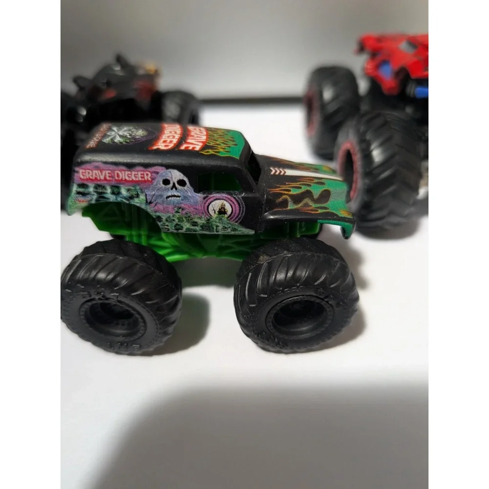 Monster Jam Hot Wheels Monster Truck Lot of 4 Grave Digger Megalodon Spiderman